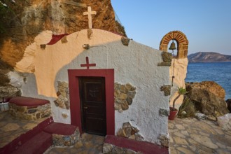 Legend, Crab, Mussel fisherman, Small coastal chapel with wooden facade facing the sea and embedded