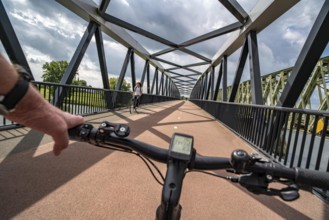 Ride over the De Massover cycle path bridge, over the Meuse south of Nijmegen, near Cuijk, part of