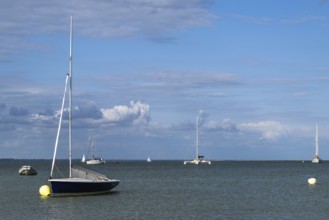 Boats on sea over Knoll Beach Studland, Poole, Dorset, England, United Kingdom