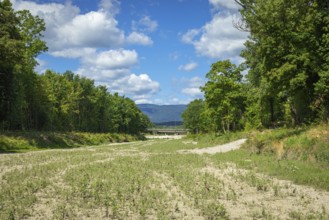 Wide dry riverbed of the Schwarza with a view of mountains, Neunkirchen, Lower Austria, Austria