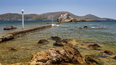 Rocky coastal landscape with lonely chapel, accessible from path, in calm waters, chapel, church,