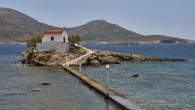 Whitewashed chapel with red roof on island in blue sea under sunny sky, chapel, church, Agios