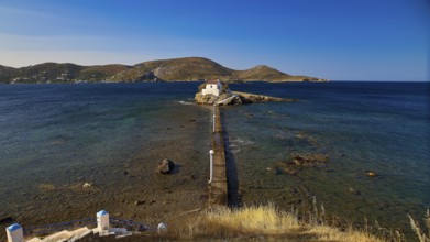 Distant view of the chapel on a rocky island, surrounded by mountains and sea, chapel, church,