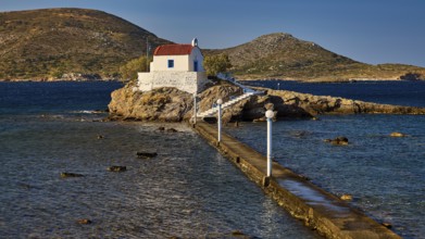 Detailed view of a chapel on a rock in the sea, connected by a long footbridge, chapel, church,