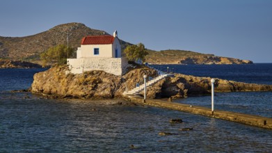 Chapel on rock in the warm morning light, surrounded by calm sea, Chapel, Church, Agios Isidoros,