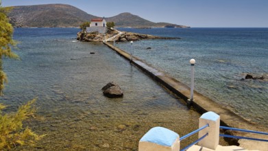 Rocky coast with chapel, surrounded by clear water and hilly island landscape, Chapel, Church,