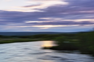 River landscape, evening sky, motion blur, light reflections, text free space, Iceland
