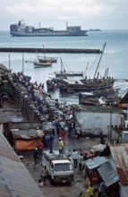 Hustle and bustle in the harbor, container ship, Zanzibar, Tanzania, Africa, June 2000, vintage,