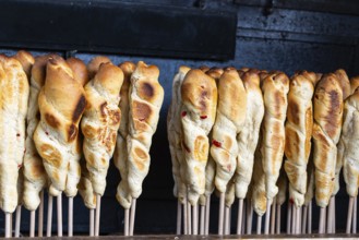 Stockbrot, Christmas market, city of Esslingen, district of Esslingen, Baden-WÃ¼rttemberg, Germany