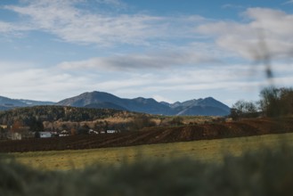 Extensive landscape with mountains in the background under clear blue sky, Ternitz, Lower Austria,