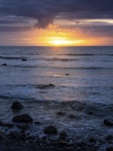 Sea in the evening at sunset, west coast of the Taranaki region, North Island, New Zealand