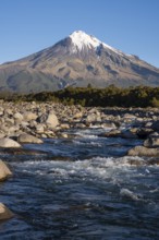 Mount Taranaki, in the foreground Stony River (Hangatahua River) . Egmont National Park, Taranaki