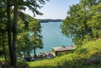 Luzin ferry station and boat rental in a wooden house on the shores of Lake Schmaler Luzin,