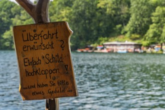 Crossing sign required, ferry station, canoe rental and cafÃ© am See Schmaler Luzin, Hullerbusch