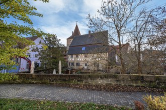 Historic city wall with old town houses, half-timbered house from 1799 in the back, Lauf an der