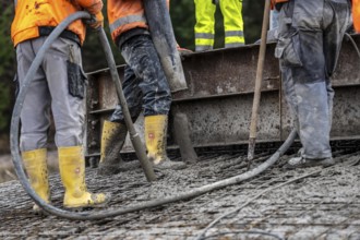 Concreting, concreting the foundation of a wind turbine, concrete pump hose, compressor, more than