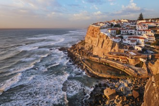 Scenic view of the seaside Azenhas do Mar fishing village on cliff on Atlantic ocean coast,