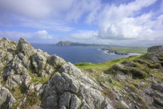 Coast with cliffs in the background An TriÃºr DeirfÃ©ar (The Three Sisters) from Clogher Head,