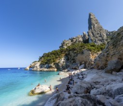 Light blue clear sea on a dream beach on Cala GoloritzÃ©, picturesque rocky coast, steep coast with