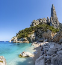Light blue clear sea on a dream beach on Cala GoloritzÃ©, picturesque rocky coast, steep coast with