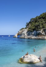 Light blue clear sea on a dream beach on Cala GoloritzÃ©, picturesque rocky coast, cliffs with rock