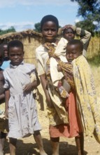 Children posing for the camera on the side of the road, Bwangu Mzimba, Malawi, Africa, June 2000,