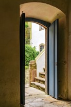 Door in a historic colonial-style mansion overlooking the house's inner courtyard in Ouro Preto