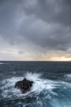 Sunrise, waves and rocks, coast near Porto Moniz, Madeira, Portugal