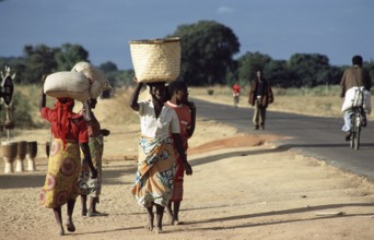 Women with payloads, Salima, Malawi, Africa, June 2000, vintage, retro, old, historic