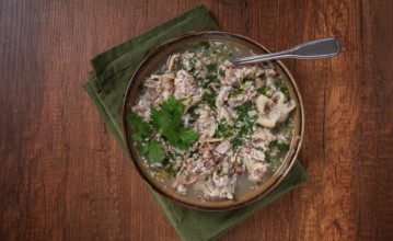 Muzhuzhi, a Georgian dish made from pork legs, with spices and herbs, homemade