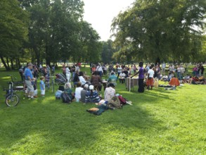 Many people at a music performance, Englischer Garten, Munich, Bavaria, Germany