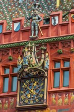 Exterior view of the magnificent clock at the Red Town Hall, Market Square, Basel