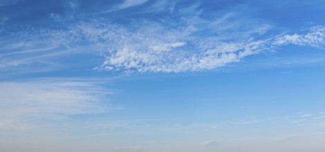 Peaceful and serene sky with clouds background