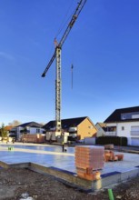 Construction site with finished cast foundation for an apartment building, Lippstadt, North