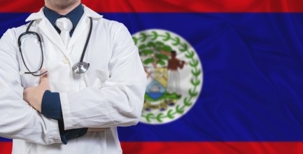 Male doctor with stethoscope on Belize flag. Doctor holding stethoscope on Belize flag
