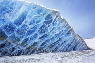 Glacier wall showing smooth melting blue ice made of compressed snow, Spitsbergen / Svalbard,