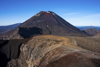 Mount Ngauruhoe and the Tongariro Alpine Crossing hiking trail in Tongariro National Park. North