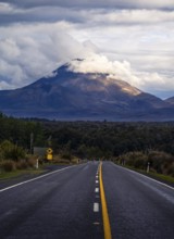 Roadshot, Mount Ngauruhoe evening at sunset, road SH 47. Tongariro National Park, North Island, New