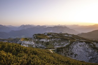 At the Berchtesgaden High Throne in summer at sunset, view of the StÃ¶rhaus on Untersberg.