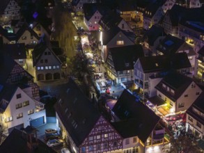Night view of a village with illuminated half-timbered houses and roads, Aidlingen Christmas