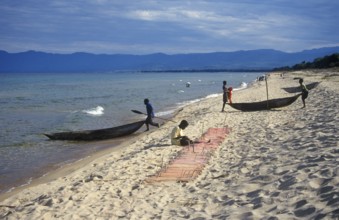 Dugout trees, fishermen at Kande Beach on Lake Malawi, Malawi, Africa, July 2000, vintage, retro,