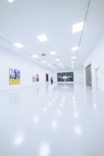 Bright, modern art gallery with various paintings on the walls, Open Horizons exhibition, Schauwerk