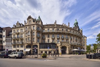 Historic building, former hotel palace hotel, barrier bollard, street, round faÃ§ade with windows,