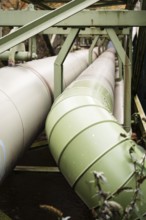 District heating pipeline on the banks of the Wupper, Wuppertal, Germany