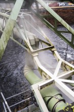District heating pipeline over the Wupper river, steam escapes, Wuppertal, Germany