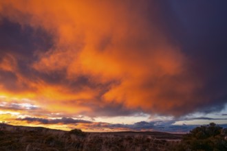 Cloudy sky at sunset, Tama Lake Walk (Tama Lakes Track) . Tongariro National Park, North Island,