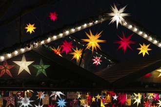 Night shot, sales stand for poinsettias glowing stars, decoration, Christmas stalls, Christmas