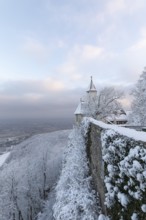 A wonderful winter landscape shows the snow-covered Teck Castle as the first rays of sunshine