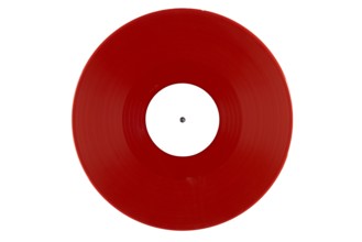 Red vinyl record with a white label in the middle on a white background