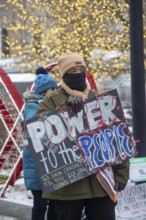 Detroit, Michigan - Residents picket DTE Energy, opposing the electric utility's plan to provide